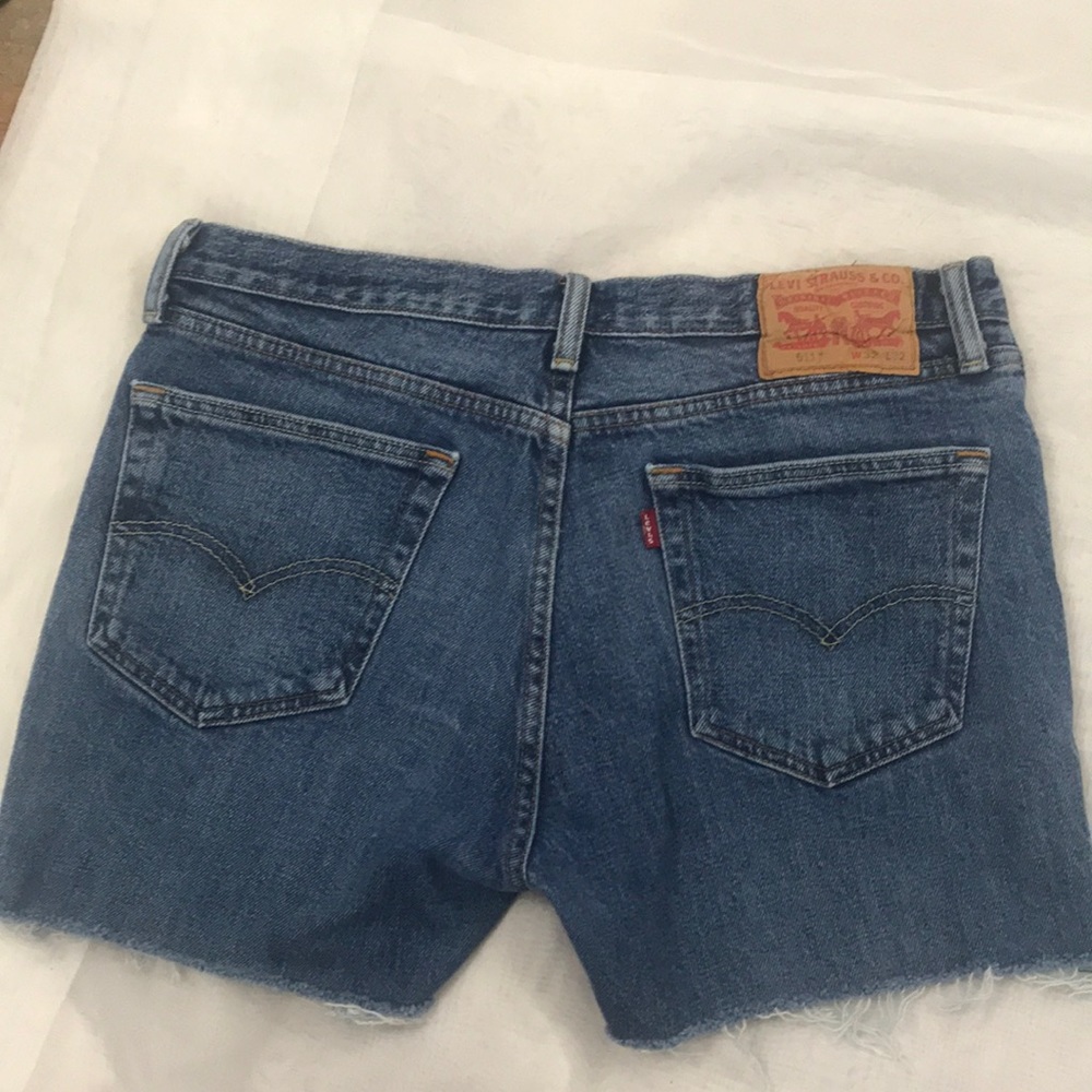 Levi’s 511 distressed edge cutoffs Size 32